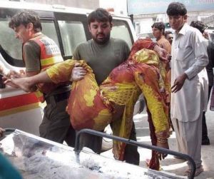 Woman injured in attack on church in Peshawar, Pakistan. (Morning Star News)